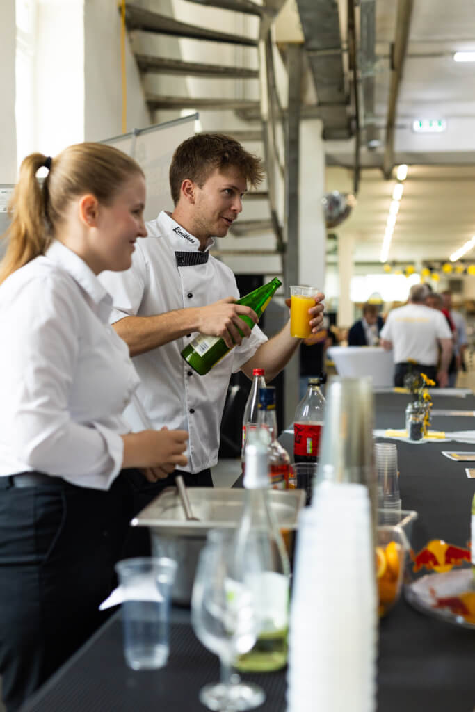 Serving Drinks - Limitless Catering